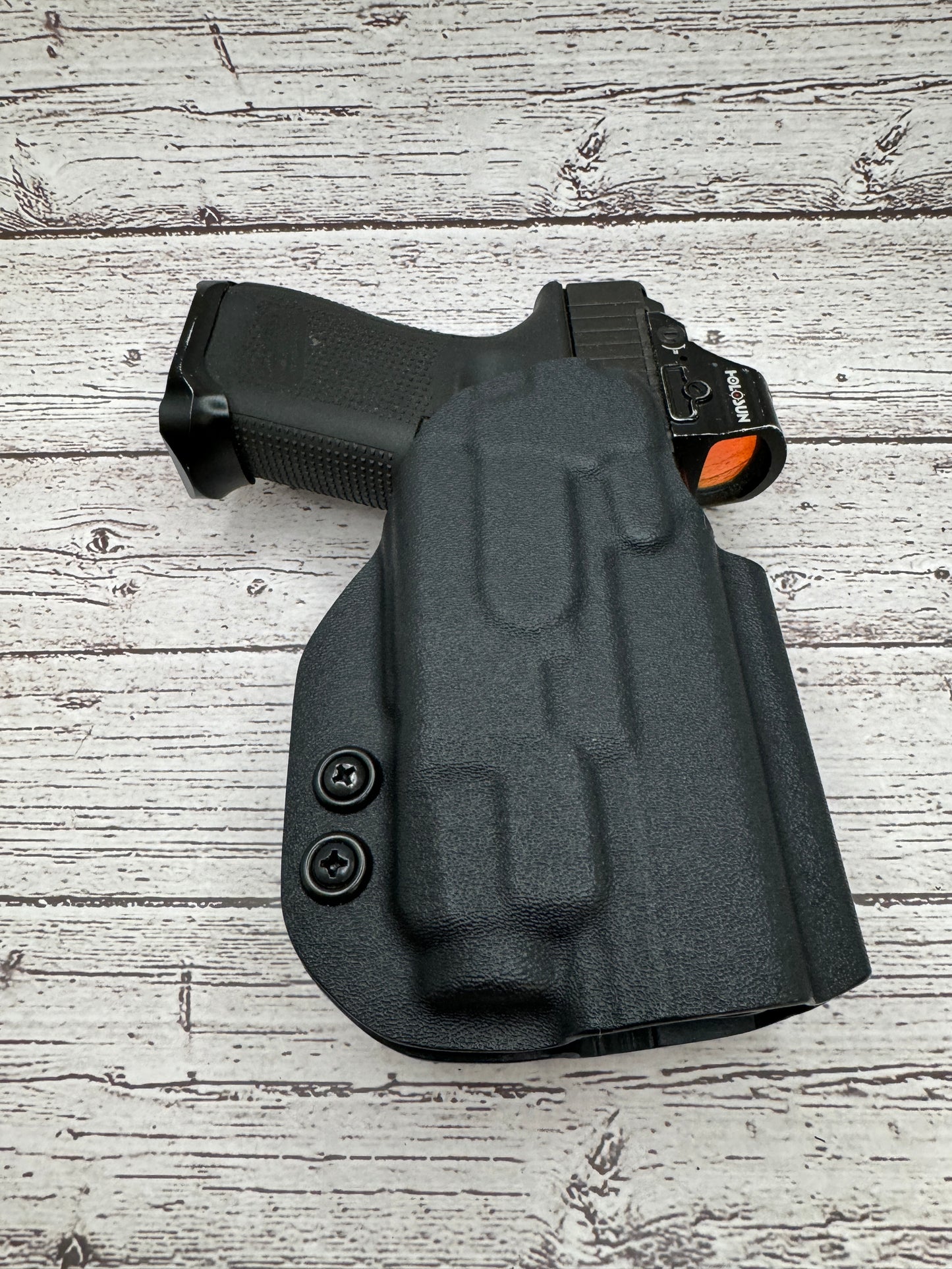 Light Bearing  OWB Paddle Holster for Glock 17 / 47  Pistol.
