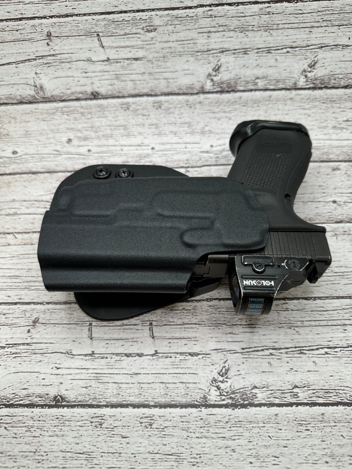 Light Bearing  OWB Paddle Holster for Glock 17 / 47  Pistol.