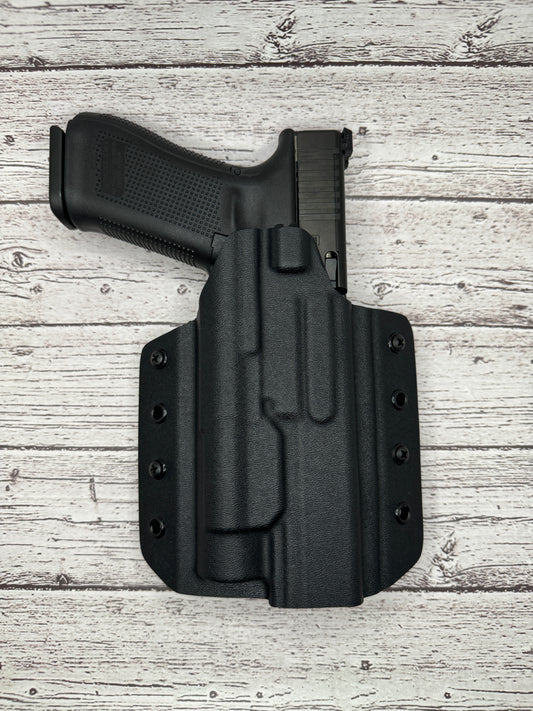 Light Bearing OWB Holster for Glock 34 Pistol .