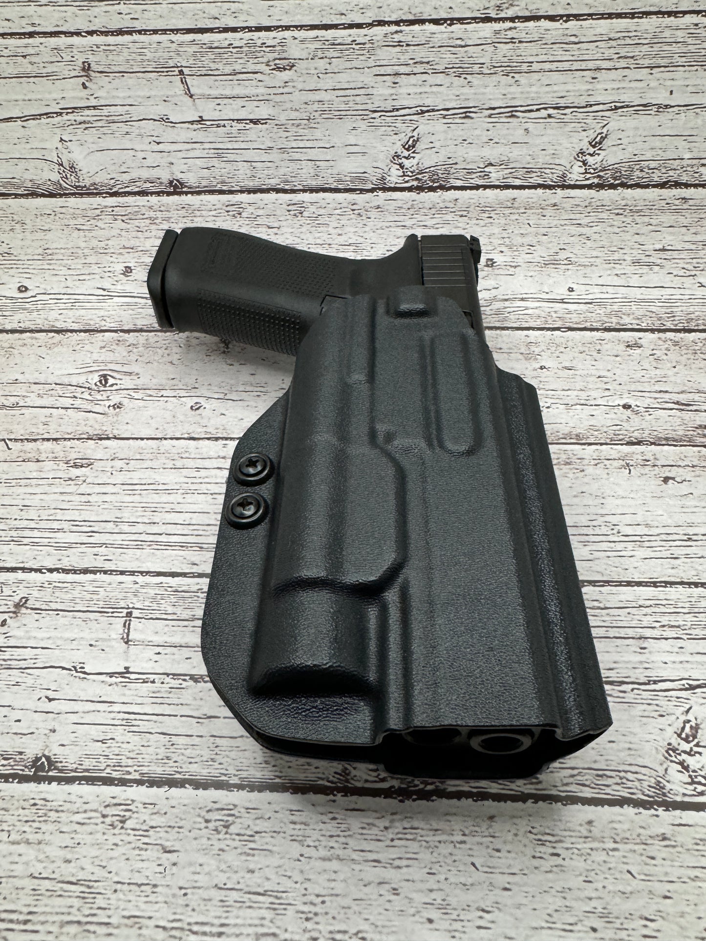Light Bearing Paddle OWB Holster for Glock 34 Pistol .