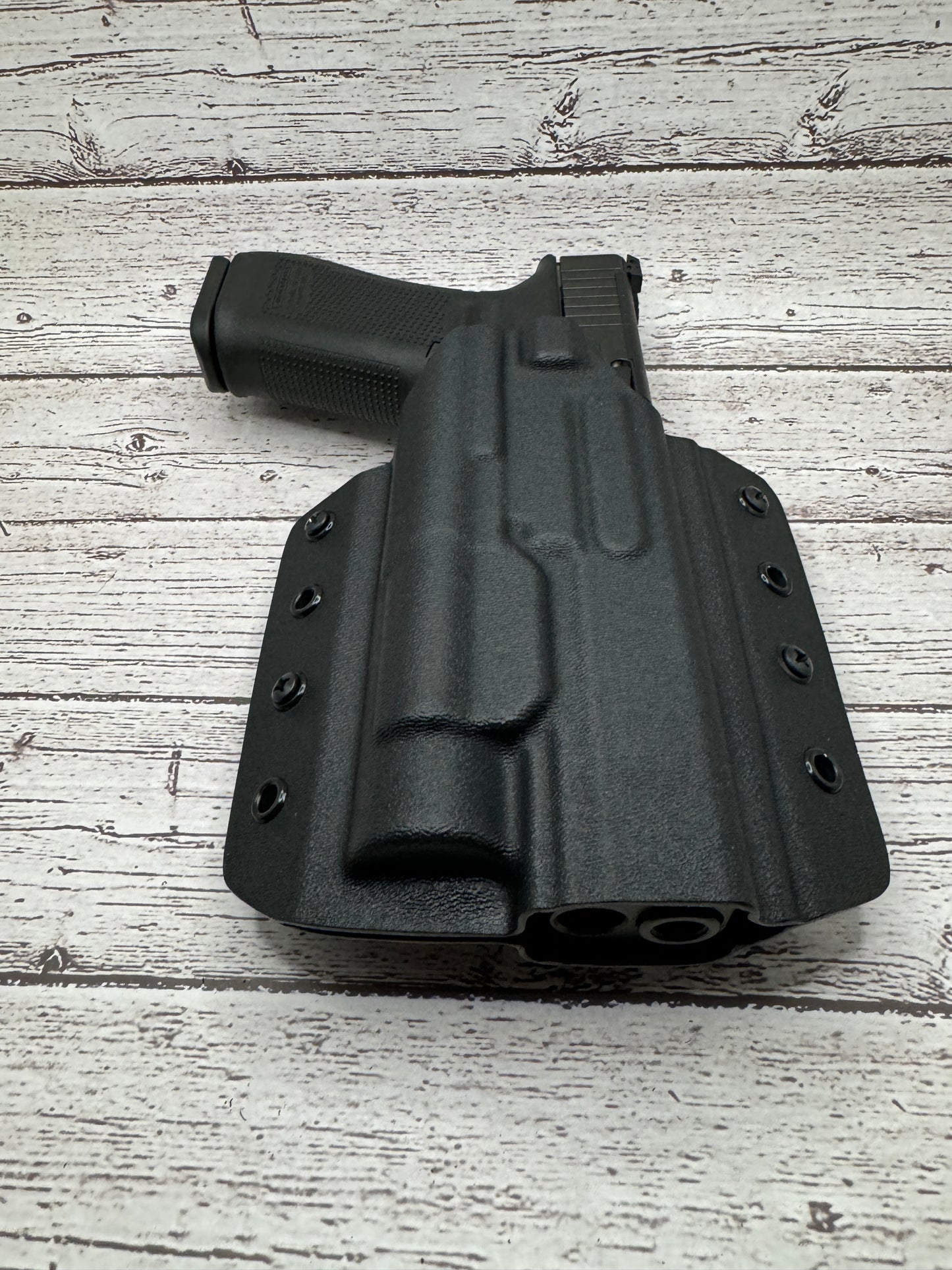 Light Bearing OWB Holster for Glock 34 Pistol .