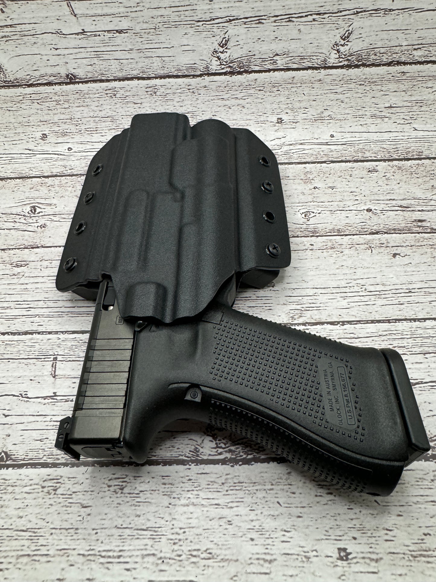 Light Bearing OWB Holster for Glock 34 Pistol .
