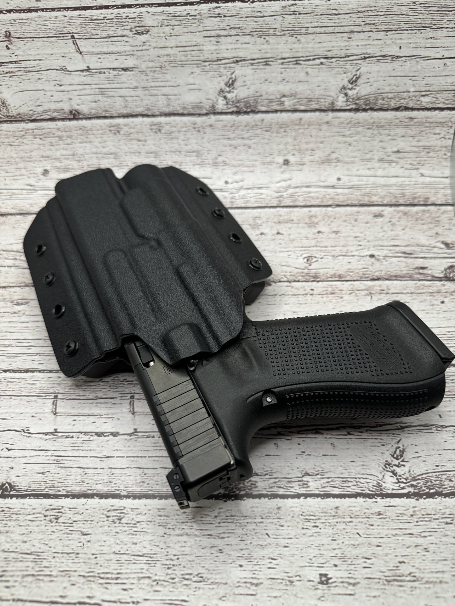Light Bearing OWB Holster for Glock 34 Pistol .