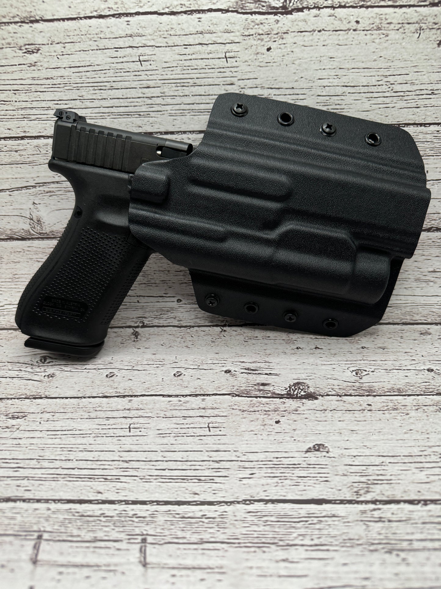 Light Bearing OWB Holster for Glock 34 Pistol .