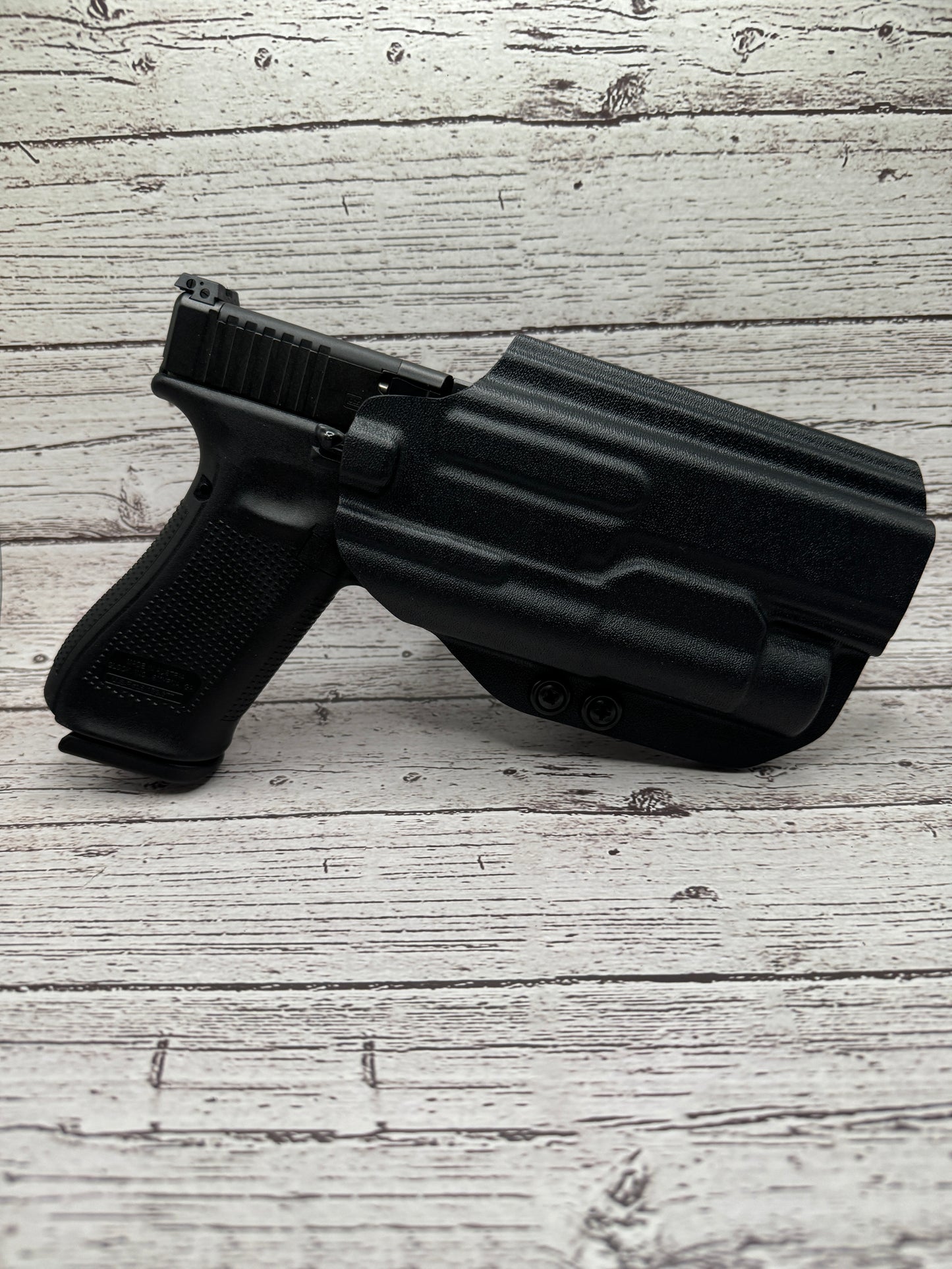 Light Bearing Paddle OWB Holster for Glock 34 Pistol .