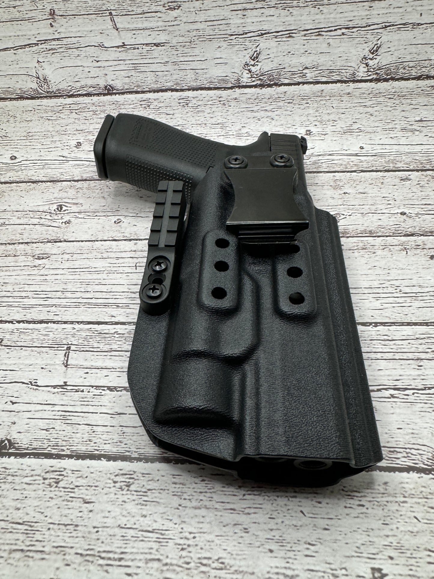 Light Bearing IWB Holster for Glock 34 Pistol .